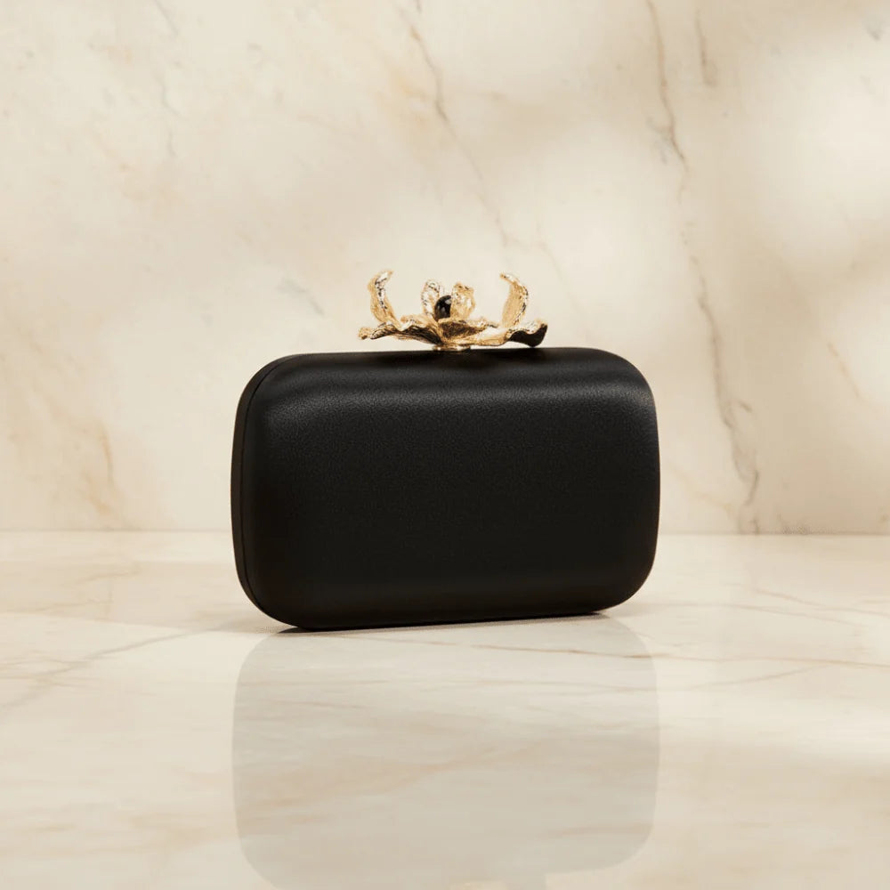 Adele Orchid Lock Clutch Black